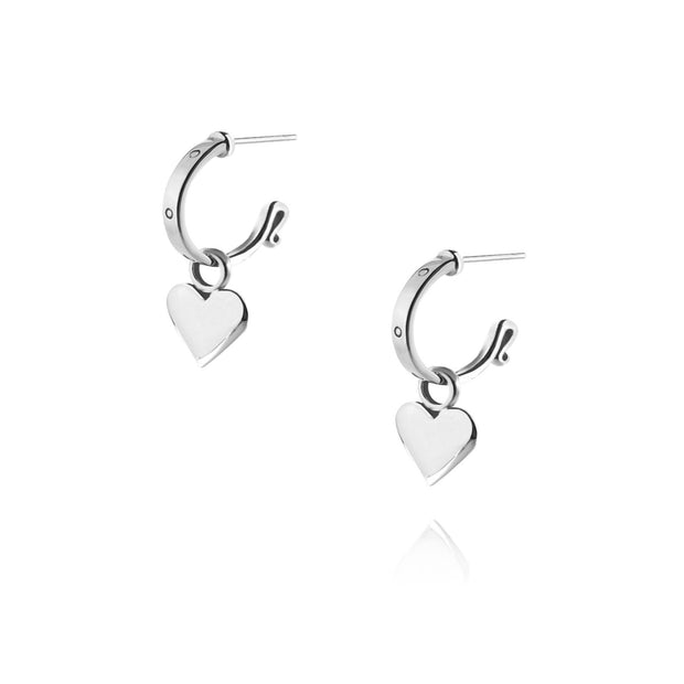 designer solid silver leather strap hoops with removable heart drop earrings on white background.