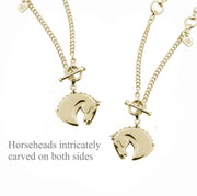 Designer gold horsehead heavy lariat neckchain showing carved detail on both sides