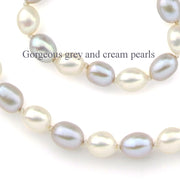 a close up image of the grey and cream colour of the cultured pearls in the necklace