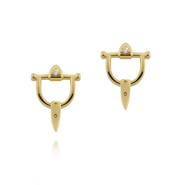 Designer solid gold and diamond horsebit earrings.