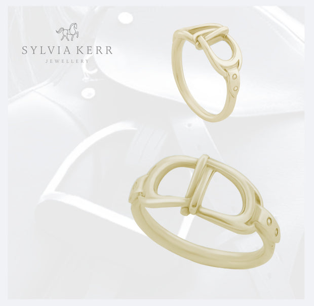 designer gold interlacing stirrup ring on saddle and stirrup background