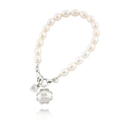designer silver and pearl bracelet with retro daisy charm