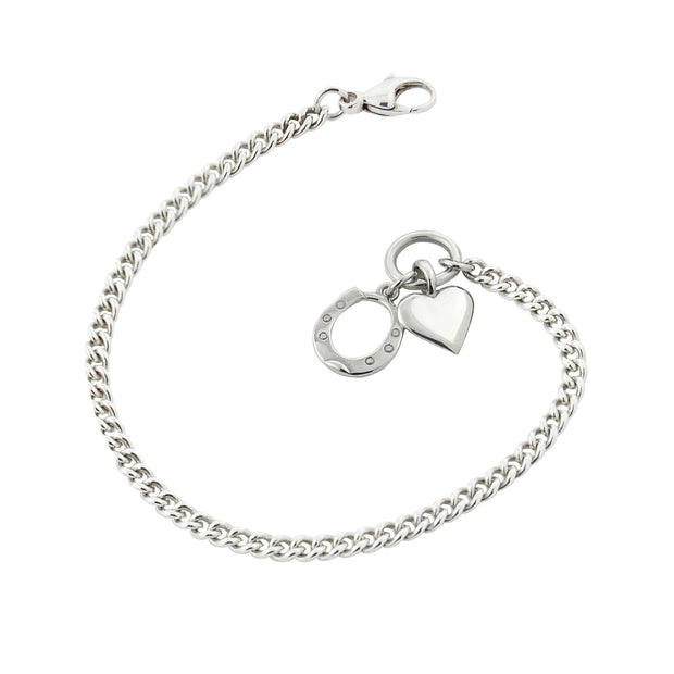 designer solid silver curb chain bracelet with heart and horseshoe charms.