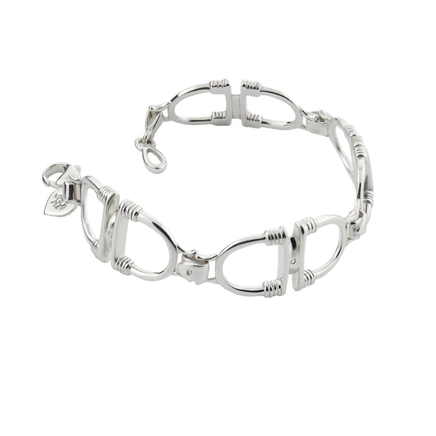 designer solid silver stirrup and leather strap bracelet on white background
