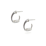 designer solid silver stirrup inspired hoop earrings on a white background.