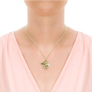 model wearing designer gold carved Hare necklace
