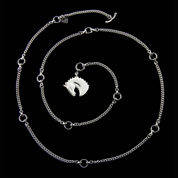 designer solid silver carved horsehead lariat chain necklace on black background