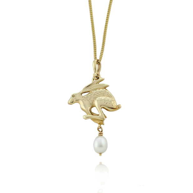 designer solid gold hare necklace with cultured pearl drop.