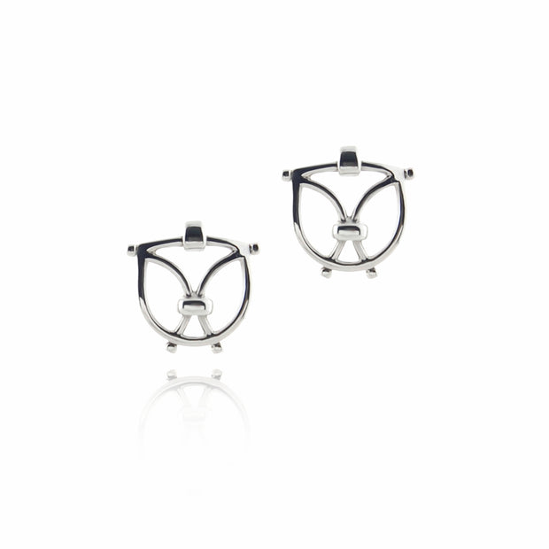 solid silver designer wrought iron inspired earrings on white background.
