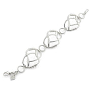 Designer solid silver double polo mallet Signature Bracelet on white background.
