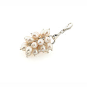 designer pearl and solid silver equestrian styled bauble with trigger clasp on white background