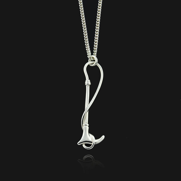 Designer solid silver hunting crop necklace on white background.