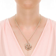 neck shot of model wearing designer silver wrought iron work inspired necklace