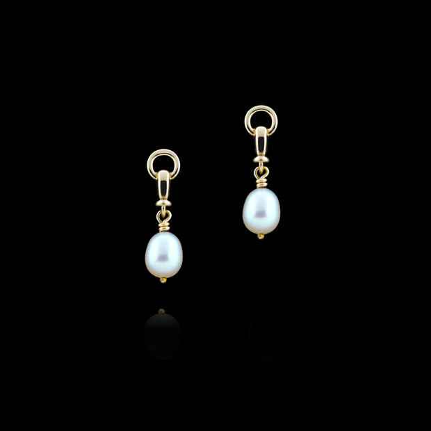 designer gold and cultured pearl ascot drop earrings on black background